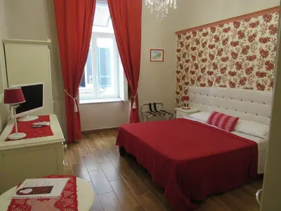 Letto o letti in una camera di Bed and Breakfast Speranzella