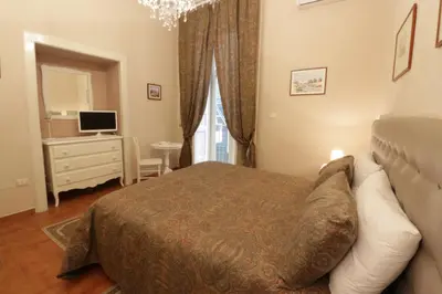 Letto o letti in una camera di Bed and Breakfast Speranzella