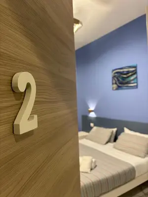 Letto o letti in una camera di B&B CADIFRA Portapiccola
