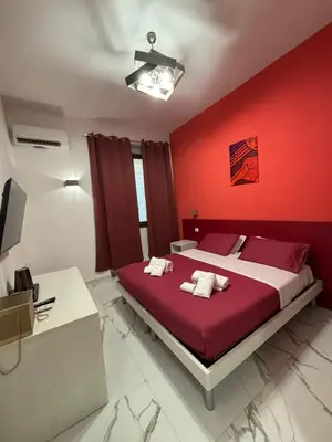 Letto o letti in una camera di B&B CADIFRA Portapiccola