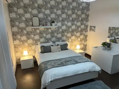 Letto o letti in una camera di Napoli Olè suite