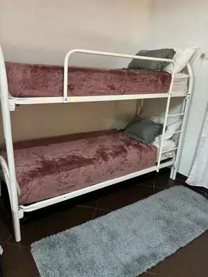 Letto o letti in una camera di Napoli Olè suite
