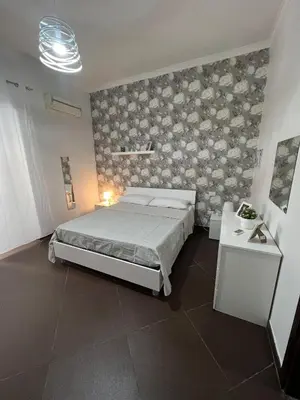 Letto o letti in una camera di Napoli Olè suite