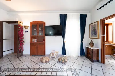 TV o dispositivi per l'intrattenimento presso Casa Raffaela with Terrace by Wonderful Italy