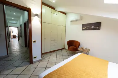 Letto o letti in una camera di Casa Raffaela with Terrace by Wonderful Italy