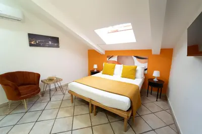 Letto o letti in una camera di Casa Raffaela with Terrace by Wonderful Italy