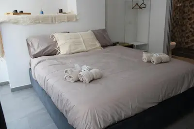 Letto o letti in una camera di Mimmù Private rooms - Porto di Napoli