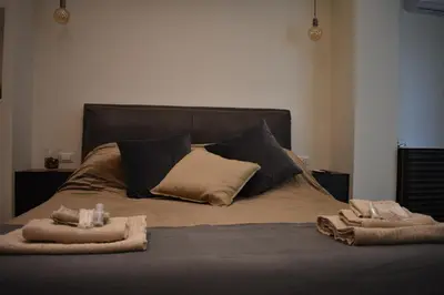 Letto o letti in una camera di Mimmù Private rooms - Porto di Napoli
