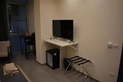 TV o dispositivi per l'intrattenimento presso Mimmù Private rooms - Porto di Napoli