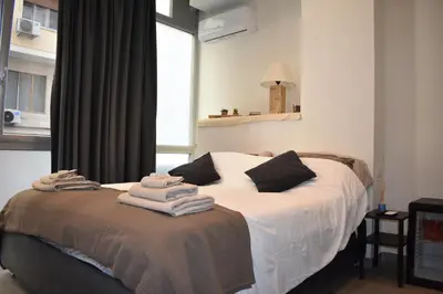 Letto o letti in una camera di Mimmù Private rooms - Porto di Napoli