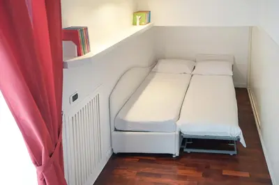 Letto o letti in una camera di Chiatamone Premium Apartment