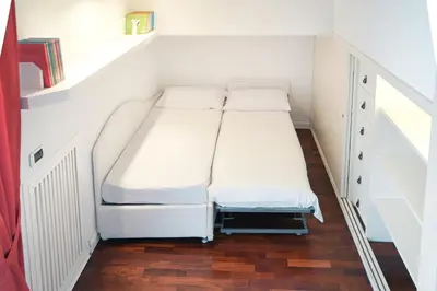 Letto o letti in una camera di Chiatamone Premium Apartment