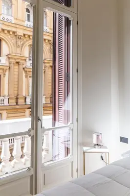 Letto o letti in una camera di La Fontana luxury House By Dimorra