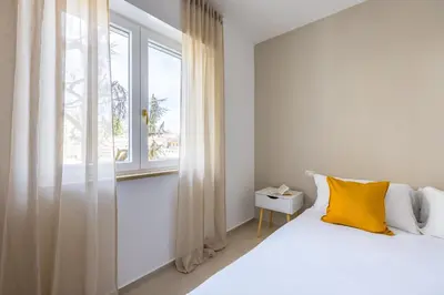 Letto o letti in una camera di Montesanto View Rooms by Wonderful Italy
