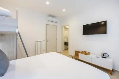 Letto o letti in una camera di Montesanto View Rooms by Wonderful Italy