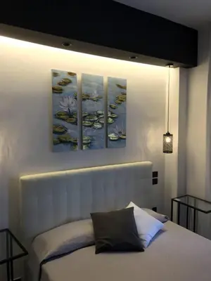 Letto o letti in una camera di Chez Anna B&B - Adults only