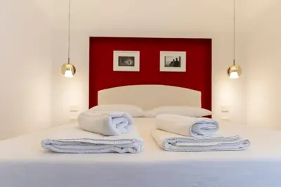 Letto o letti in una camera di Via Concezione a Montecalvario 19
