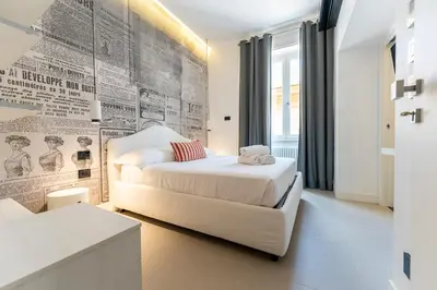 Letto o letti in una camera di Via Concezione a Montecalvario 19