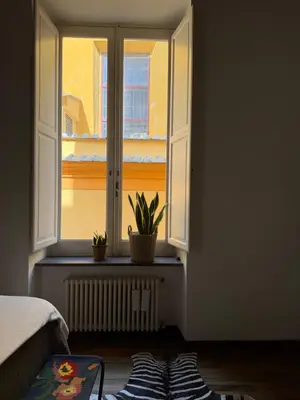 Letto o letti in una camera di La Casa dei Librai