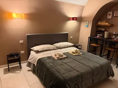 Letto o letti in una camera di Casa Carmelì