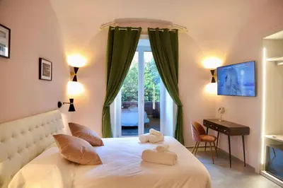 Letto o letti in una camera di Incanto Napoli