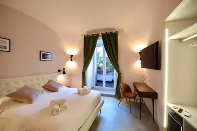 Letto o letti in una camera di Incanto Napoli