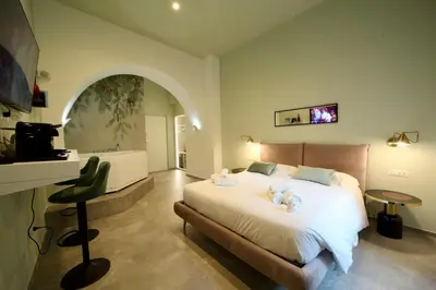 Letto o letti in una camera di Incanto Napoli