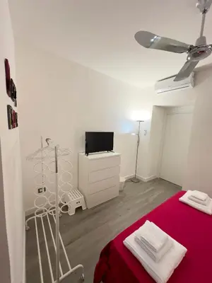 Letto o letti in una camera di Casa Carolina