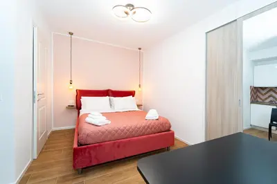 Letto o letti in una camera di Vivara - Roots Partenopee