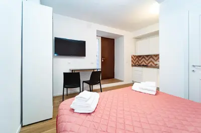 Letto o letti in una camera di Vivara - Roots Partenopee