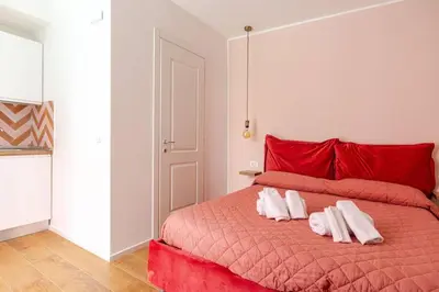 Letto o letti in una camera di Vivara - Roots Partenopee