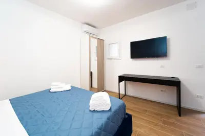 Letto o letti in una camera di Procida - Roots Partenopee