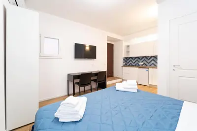 Letto o letti in una camera di Procida - Roots Partenopee