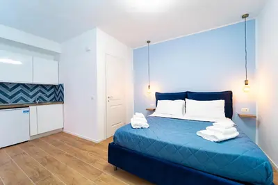 Letto o letti in una camera di Procida - Roots Partenopee