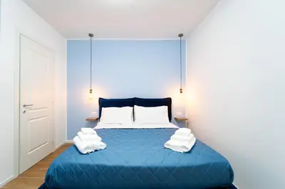 Letto o letti in una camera di Procida - Roots Partenopee