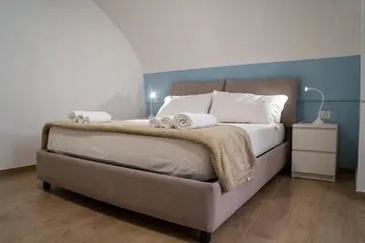 Letto o letti in una camera di Vomero 84 - Appartamento nel cuore del Vomero