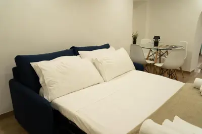 Letto o letti in una camera di Vomero 84 - Appartamento nel cuore del Vomero