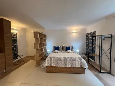 Letto o letti in una camera di Queen house