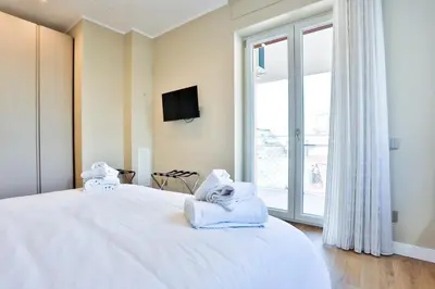 Letto o letti in una camera di GuestHost - Maison La Fontana
