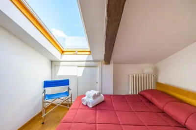 Letto o letti in una camera di Duomo Grand Family Loft