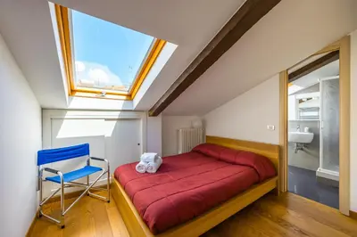 Letto o letti in una camera di Duomo Grand Family Loft