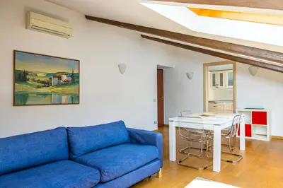 Area soggiorno di Duomo Grand Family Loft