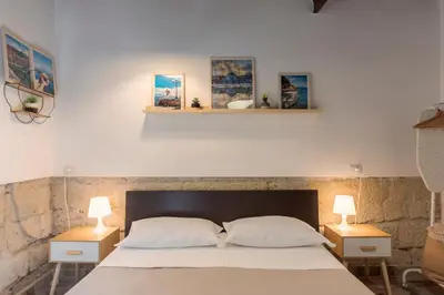 Letto o letti in una camera di Antica Napoli - Cristo Velato home