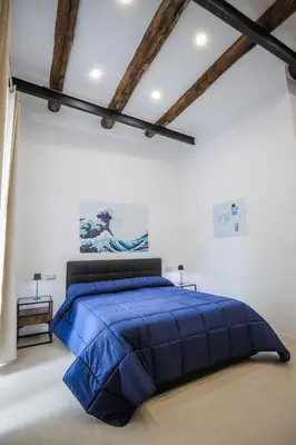 Letto o letti in una camera di Napolidays Rua Catalana Apartment