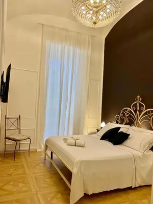 Letto o letti in una camera di Fiorentine Relais