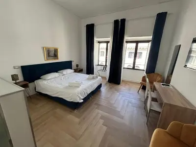 Letto o letti in una camera di casa serao