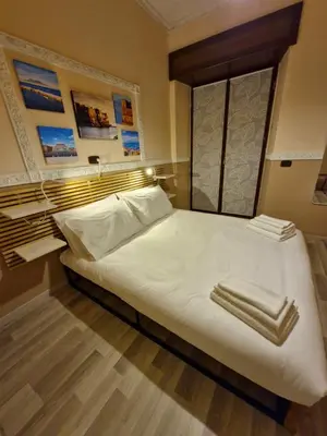 Letto o letti in una camera di casaSofì