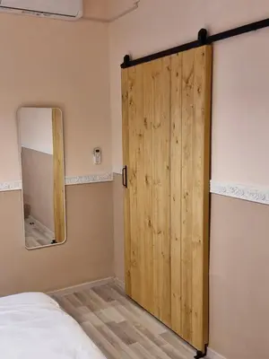 Letto o letti in una camera di casaSofì