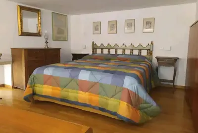 Letto o letti in una camera di Home Margherita