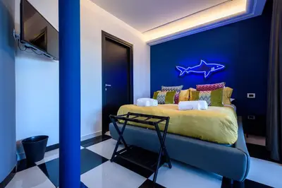 Letto o letti in una camera di D'amelios Suite 2.0